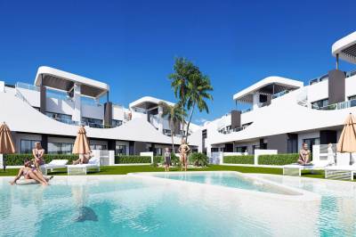 Elegante apartamento de obra nueva en planta baja con terraza y piscina comunitaria 