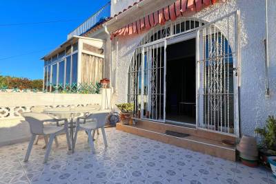 2 slaapkamer rijwoning met vanaf het dakterras een wijds uitzicht over de omgeving 